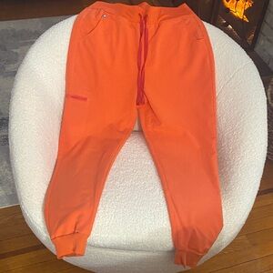 Orange Jogger Pants with Red Drawstring